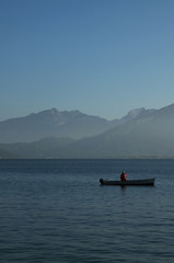 Fisherman on its boat