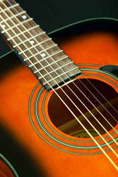 Six-string acoustic guitar
