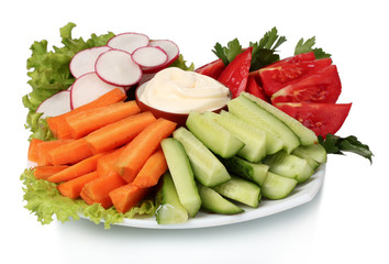 Chopped vegetables and sauce on plate isolated on white