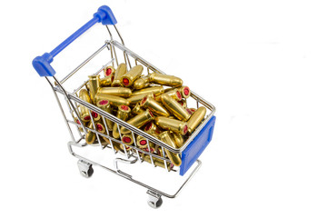 Shopping cart loaded with bullets isolated on white