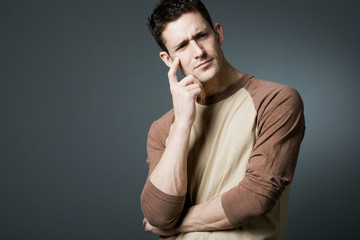 Young man resolving a problem.