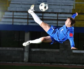 Foto op Plexiglas voetballer in actie © .shock