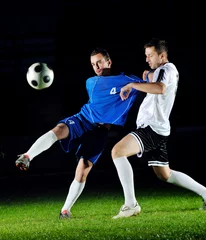Foto op Plexiglas voetballers in actie voor de bal © .shock