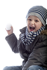 boy throwing a snow ball