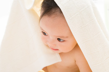 Baby coverd in towel