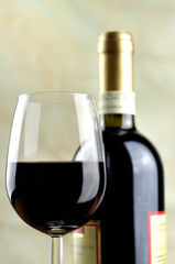 Glass and bottle of fine Italian red wine, closeup