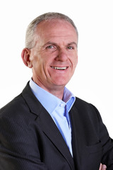 Smiling experienced businessman