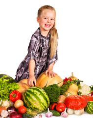 Fototapeta na wymiar Child with vegetable on kitchen.