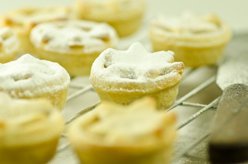 mince pies cooling on a wire rack