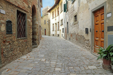 narrow italian street in tuscan borgo Montefioralle