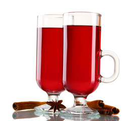 mulled wine in the glasses, cinnamon and anise isolated on white