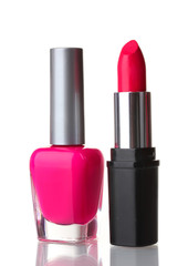 Pink lipstick and nail polish isolated on white background