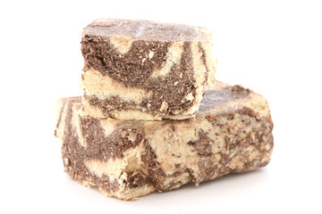 Typical Greek cacao halva dessert cut into two pieces
