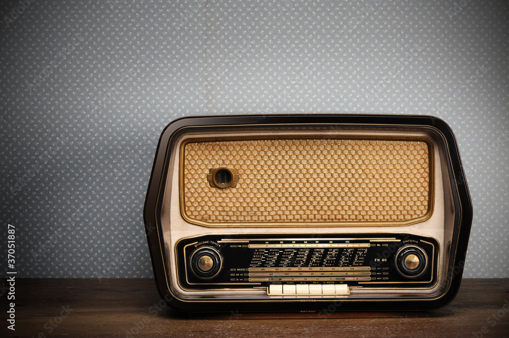 Wall mural antique radio on vintage background