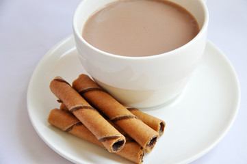 chocolate roll and cup of coffee