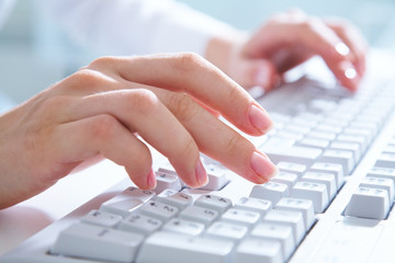 hands on computer keyboard