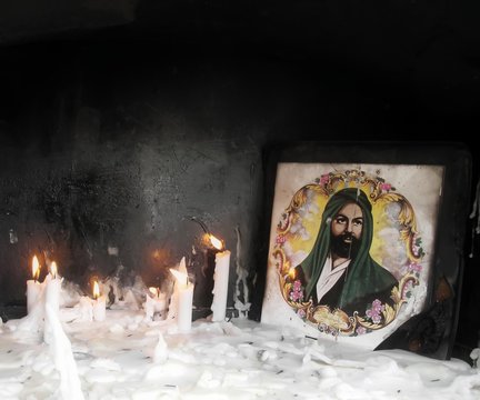 Votive Candles And Imam Hussain Icon ,third Muslim Shitte’s Imam