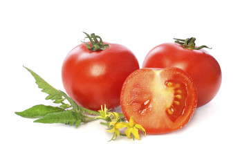 Red tomato with leaf isolated on white