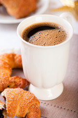 Mug of delicious coffee with christmas cake