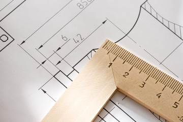 A piece of draft with drafting instrument