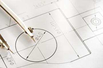 A piece of draft with drafting instrument