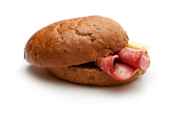 Sandwich with cheese and salami  on a white background