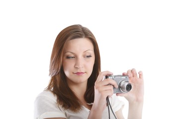 young beautiful woman with a camera (white background)