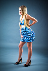 Fototapeta premium Attractive girl in blue dress,