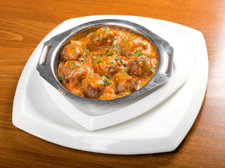 meatballs in tomato sauce on a plate