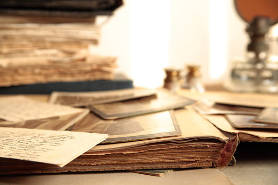 Close-up of old photos,books and letters.