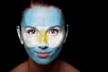 Portrait of a woman with the flag of the Argentine