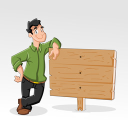 Young man and wood billboard with empty space