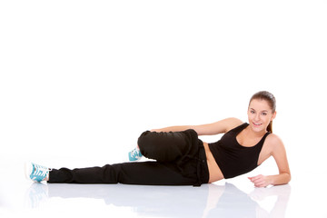 Beautiful fitness woman doing stretching exercise