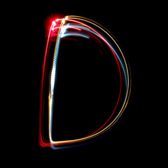 Letter D made from brightly coloured neon lights