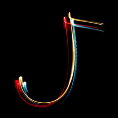 Letter J made from brightly coloured neon lights