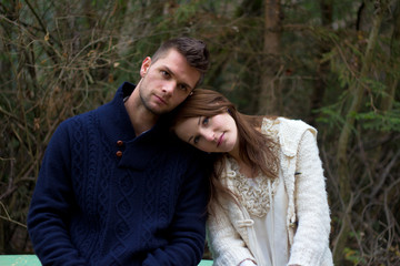 Fototapeta premium Young couple in the forest head on head