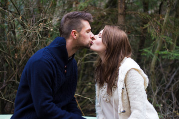 Fototapeta premium Young couple kissing