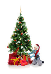 Cheerful boy in Santa Claus hat