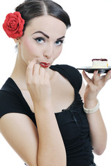 Naklejka premium beautiful young woman eat sweet cake