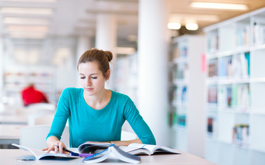female college student in a library