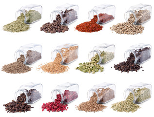 Spices and herbs are scattered on a white background