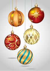 Christmas Ornaments Hanging on Gold Thread