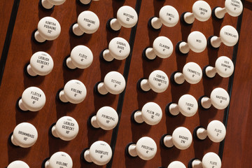 Pipe organ stop knobs close up