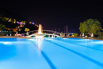 Water pool and fountain at night