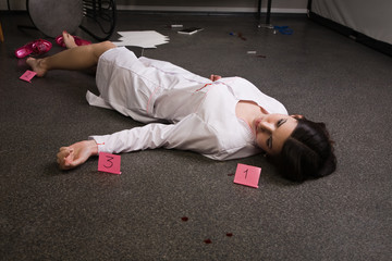 Nurse lying on the floor
