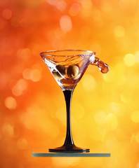 martini and green olives.