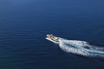 Speed boat aerial view on blue sea