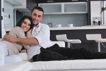 Obraz premium happy young couple relax at home