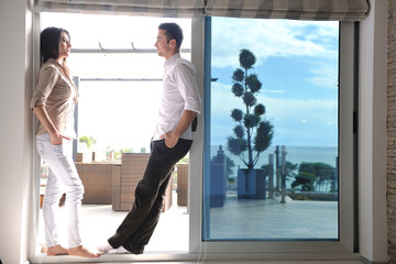 Fototapeta premium happy young couple relax at home