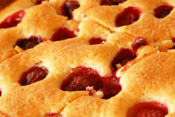Cake with cherries and raspberries